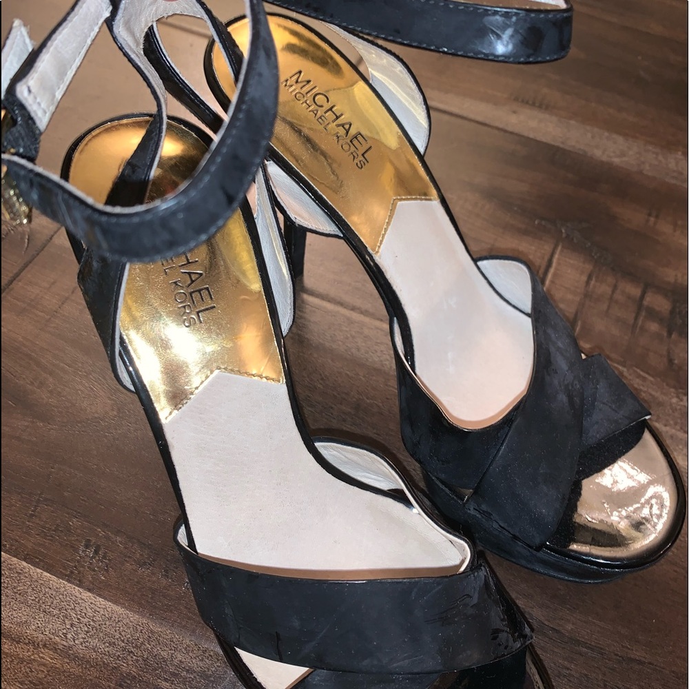 A very elegant pair of black Michael Kors heels